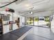 Spacious two-car garage with ample storage, workbench, and an easy entrance at 11342 Hollander Ave, Hudson, FL 34667