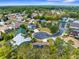 Neighborhood aerial shot showcases the community layout, well-maintained homes, and lush green spaces at 11443 Marsh Creek Ct, New Port Richey, FL 34654