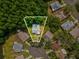 Aerial view highlighting the property's location surrounded by mature trees in a quiet neighborhood at 11512 Yellow Birch Ct, New Port Richey, FL 34654