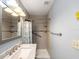 Bathroom featuring a shower, sink and mirror at 11512 Yellow Birch Ct, New Port Richey, FL 34654