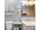 Bathroom featuring a white sink vanity and toilet at 11512 Yellow Birch Ct, New Port Richey, FL 34654