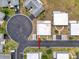 Aerial view of a single-story home with a gray roof in a neighborhood cul-de-sac at 11601 Bayonet Ln # 163A2, New Port Richey, FL 34654