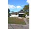 Charming Summer Tree Golf Club with well-manicured lawn and inviting entrance at 11601 Bayonet Ln # 163A2, New Port Richey, FL 34654