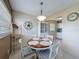 Charming dining area with backyard access, offering seamless indoor-outdoor living at 11601 Bayonet Ln # 163A2, New Port Richey, FL 34654