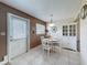 Bright dining area with a view, perfect for enjoying meals with friends and Gathering at 11601 Bayonet Ln # 163A2, New Port Richey, FL 34654