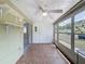 Screened porch offering tile floors and lots of natural light at 11601 Bayonet Ln # 163A2, New Port Richey, FL 34654