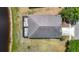 Overhead view of the property with a screened-in patio, showing the backyard and neighborhood layout at 12248 Colony Lakes Blvd, New Port Richey, FL 34654