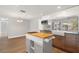 Eat-in kitchen with central island at 12407 Gunstock Ln, Hudson, FL 34667