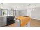 Eat-in kitchen with central island at 12407 Gunstock Ln, Hudson, FL 34667