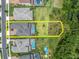 Aerial view of a single Gathering home including the backyard pool and property boundaries at 12539 Wetmore Ct, Odessa, FL 33556