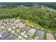 Aerial view of a single Gathering home with pool and additional land in a suburban neighborhood at 12539 Wetmore Ct, Odessa, FL 33556