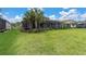 Expansive backyard with mature trees and landscaping at 12539 Wetmore Ct, Odessa, FL 33556