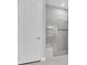 Modern bathroom featuring a glass shower with a built in bench and light gray tiling at 12539 Wetmore Ct, Odessa, FL 33556