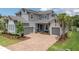 Beautiful home featuring a brick driveway, attached two-car garage, and well maintained landscaping at 12539 Wetmore Ct, Odessa, FL 33556