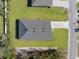 This home has a large backyard, grassy lawn, and long driveway at 14042 Amero Ln, Spring Hill, FL 34609