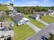 New construction homes feature modern exteriors with well-maintained lawns, long driveways, and beautiful landscaping at 14042 Amero Ln, Spring Hill, FL 34609