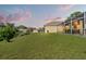Expansive backyard with well-maintained lawn, offering privacy and space for outdoor activities at 14163 Andrew Scott Rd, Spring Hill, FL 34609