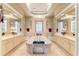 Luxurious bathroom featuring a soaking tub, dual vanities, and tile floors at 14163 Andrew Scott Rd, Spring Hill, FL 34609