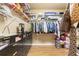 Spacious walk-in closet with custom shelving and storage for clothing and accessories at 14163 Andrew Scott Rd, Spring Hill, FL 34609