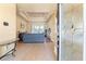 Inviting foyer with tile flooring and a decorative glass front door leading to the living area at 14163 Andrew Scott Rd, Spring Hill, FL 34609