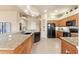 Open kitchen featuring granite countertops and stainless steel appliances at 14163 Andrew Scott Rd, Spring Hill, FL 34609