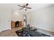 Home office featuring tile floors, desk, workout equipment, and a neutral color palette at 14740 Loma Ave, Spring Hill, FL 34610