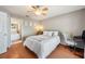 This bedroom features an ensuite bathroom and plenty of natural light from the nearby window at 1486 Loman Ct, Palm Harbor, FL 34683