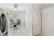 Eat-in kitchen with stainless steel appliances and a cozy breakfast nook with natural light at 1486 Loman Ct, Palm Harbor, FL 34683