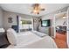 This main bedroom includes access to the lanai, a TV, and an adjoined living room, all great for relaxing at 1486 Loman Ct, Palm Harbor, FL 34683