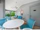 Pool area features seating, shade, and updated equipment at 1486 Loman Ct, Palm Harbor, FL 34683