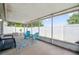 Spacious screened porch offers ample seating, room for entertaining, and views of the backyard at 1486 Loman Ct, Palm Harbor, FL 34683