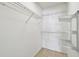 A walk-in closet featuring wire shelving and tile flooring at 1486 Loman Ct, Palm Harbor, FL 34683