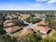 Spacious residential neighborhood aerial view near golf course, featuring well-maintained homes, landscaping, and community amenities at 15038 Sterling Run, Brooksville, FL 34609