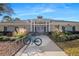 Silverthorn Community Center exterior with lush landscaping and bike rack near sidewalk at 15038 Sterling Run, Brooksville, FL 34609