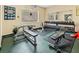 Well-equipped fitness center with weightlifting machines and free weights at 15038 Sterling Run, Brooksville, FL 34609