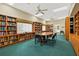 A reading room offers an assortment of books and reading materials for its residents at 15038 Sterling Run, Brooksville, FL 34609