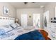 Bright main bedroom offers an ensuite bathroom, closet and luxury vinyl floors at 15038 Sterling Run, Brooksville, FL 34609