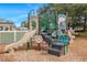Community playground with slide and climbing area on wood mulch at 15038 Sterling Run, Brooksville, FL 34609