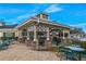 Pool area with tables and chairs, grill and open air hangout for neighbors at 15038 Sterling Run, Brooksville, FL 34609