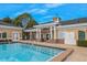 The pool sits next to the clubhouse in a beautiful setting at 15038 Sterling Run, Brooksville, FL 34609