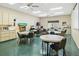 The recreation room provides residents with tables, chairs, and recreational equipment for leisure and entertainment at 15038 Sterling Run, Brooksville, FL 34609