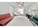 Bright bedroom with comfortable seating, neutral colors, and ample natural light at 1723 Cortleigh Dr, Trinity, FL 34655