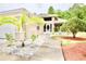 Well-maintained home featuring a manicured front yard, walkway, and inviting entrance, enhancing its curb appeal at 1723 Cortleigh Dr, Trinity, FL 34655