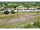 Scenic aerial shot of homes in an active community with well-maintained lawns and a serene, open environment at 18418 Bent Pine Dr, Hudson, FL 34667