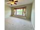 Cozy bedroom with bay window and built-in window seat at 18418 Bent Pine Dr, Hudson, FL 34667