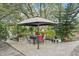 Outdoor patio featuring a covered gazebo and seating area at 18633 Oak Way Dr, Hudson, FL 34667