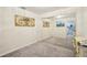 Neat bedroom with mirrored closets for a seamless, spacious feel and natural light at 18633 Oak Way Dr, Hudson, FL 34667
