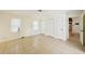 Bright bedroom with tiled flooring and large closets for ample storage space at 18633 Oak Way Dr, Hudson, FL 34667