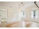 Charming dining room featuring a decorative chandelier and natural light at 18633 Oak Way Dr, Hudson, FL 34667