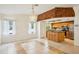 Open dining room connects to the kitchen with an island at 18633 Oak Way Dr, Hudson, FL 34667